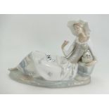 Large Nao figure of a lady reclining on