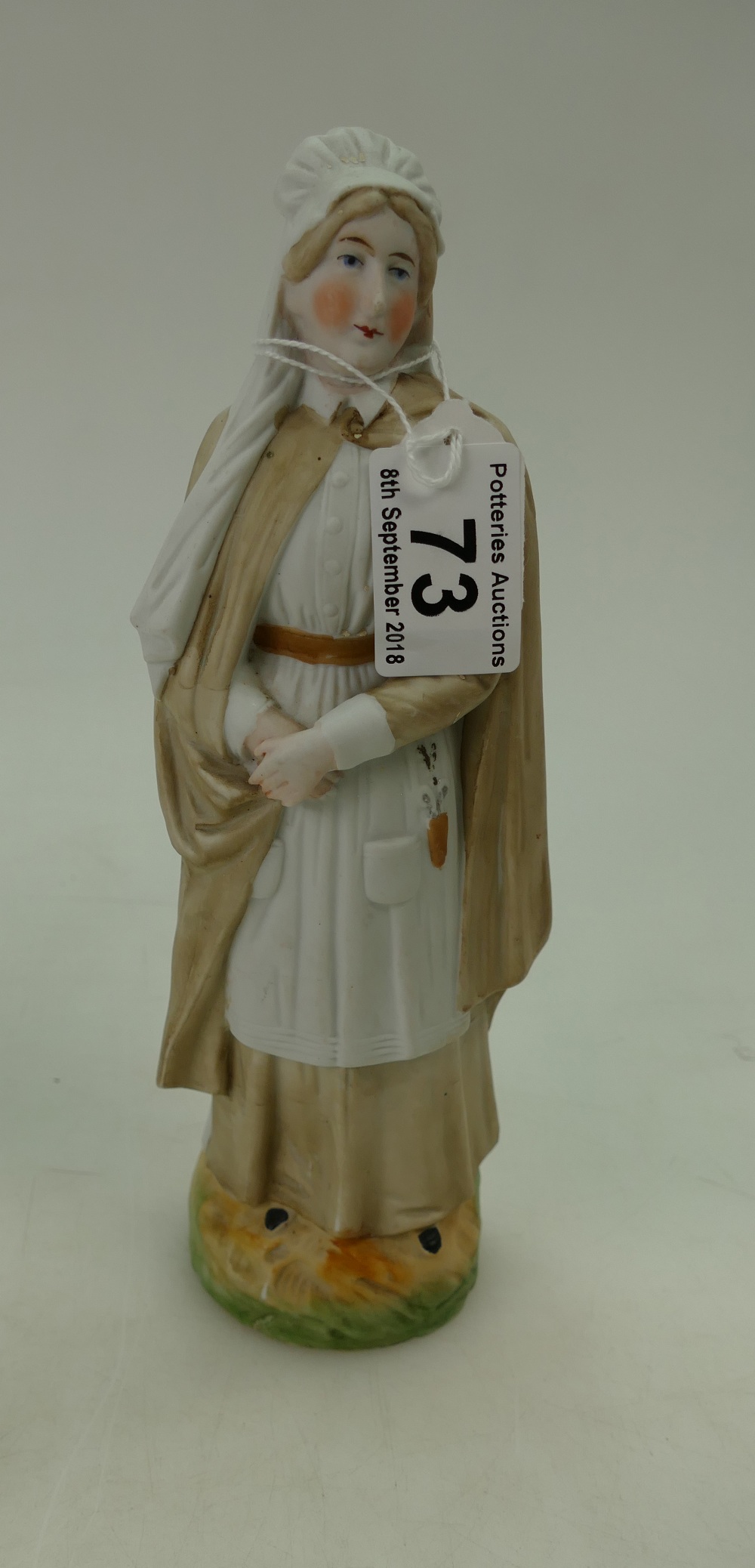 Bisque porcelain figure of a WW1 nurse m