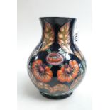 Moorcroft vase decorated in the Fantazie