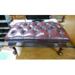 Oxblood Chesterfield style foot stool.