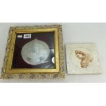 An unusual framed mother of pearl carved and pierced shell with the place of Jerusalem inscribed