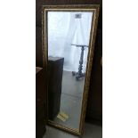 Gilt framed bevel edged mirror