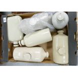A collection of stone ware bed warmer bottles