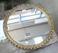 Gilt framed circular wall hanging mirror