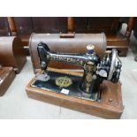Vintage oak cased gilded singer sewing machine model no.
