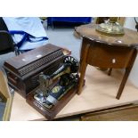 20th century oak cased decorative gilded sing sewing machine Model.