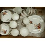 A collection of tea ware with pheasant decoration