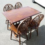 Oak Kitchen table and four matching wheel back chairs(5)
