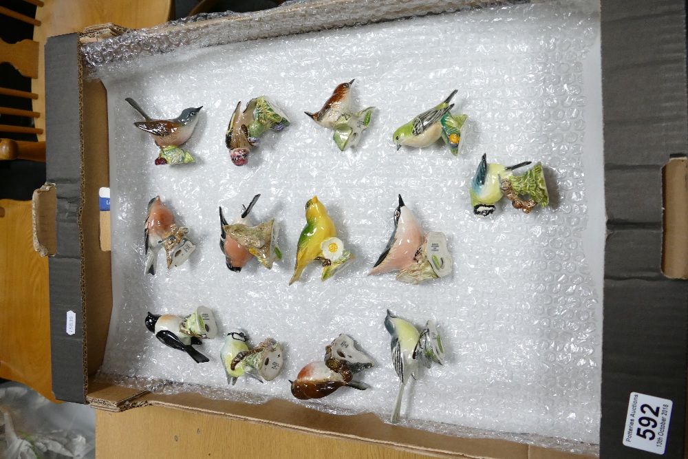 A collection of small Beswick Birds to include - Stonehatch 2274, Chaffinch 991, Whitethroat 2106,
