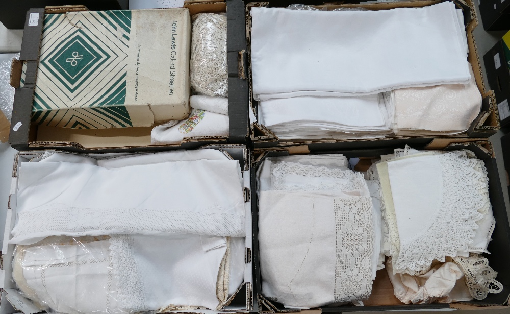 A mixed collection of items to include linens, cloths,