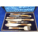 A large and comprehensive seven piece STAG ANTLER and silver mounted carving set in original