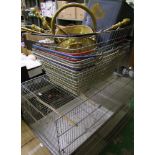 A mixed lot consisting of two bird breeding cages, retail shopping baskets, petrol can and a brass