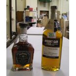 A bottle of Mount Gay black barrel Barbados rum together with a bottle of Jack Daniels single barrel