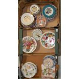 A large collection of decorative wall plates in floral and oriental designs together with Chokin