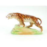 W H Goss rare model of a tiger on a rock, height 9.