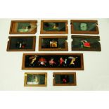 A collection of 8 mechanical mahogany framed slides, makers include Millikin and Lawley London,