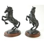 Two Royal Doulton / Beswick models of a Black rearing Welsh Cob model 1014 modelled by Arthur
