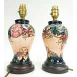 Moorcroft pair of Lamp Bases decorated with Flora & Fauna, height to fitting 25cm,