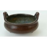 Chinese bronze circular incense burner with cast signature to base. 11cm x 6cm high.