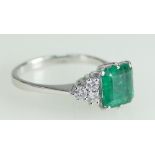 EMERALD AND DIAMOND RING - square cut stone with six Diamonds size R1/2. 4.9g total.