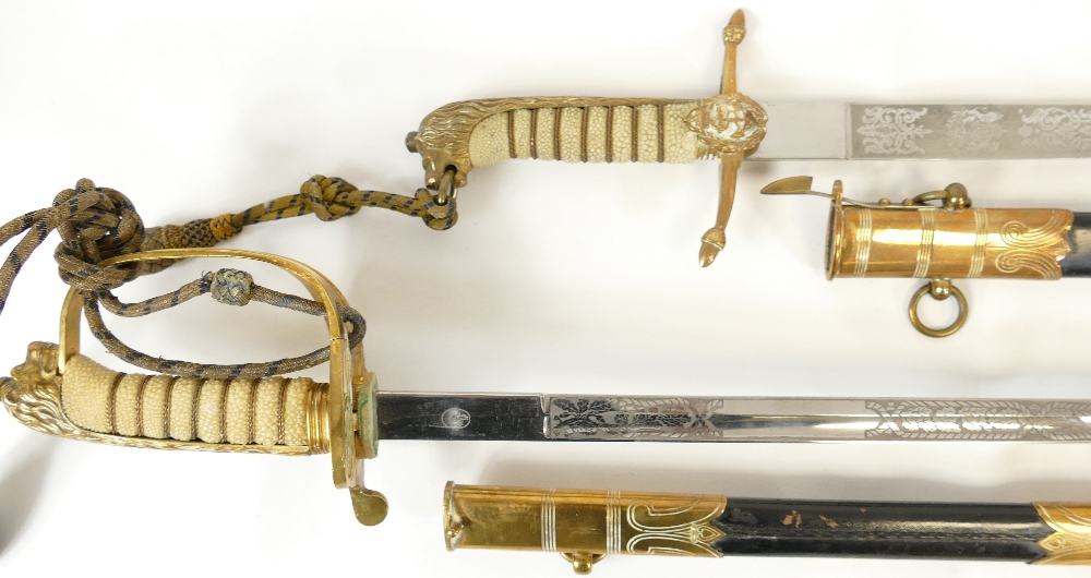 A group of interesting medals, swords and other items relating to Commander Herbert. - Image 5 of 9
