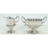 Silver two handled sugar bowl and milk jug,