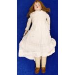 Bisque Head Doll c1900, with half leather body and arms.