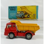 Corgi 494 Red Bedford Tipper Truck in near mint condition and in original fair to good condition