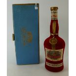 A bottle of Cherry Marnier, a cherry brandy liqueur from Marnier-Lapostolle.