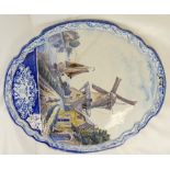 19th century Dutch Delft large oval wall plaque decorated with windmill, boat and farm,