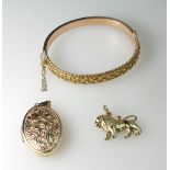 9ct Gold Chester 1897 hallmarked Bangle, together with 9ct Locket and 9ct Lion pendant, weight 17.