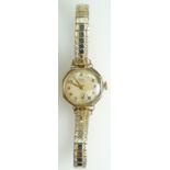 9ct Gold Ladies AVIA Wristwatch on plated bracelet, ticking.