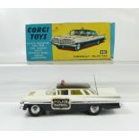 Corgi 484 White Chevrolet Police Car in near mint to mint condition.