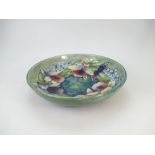 William Moorcroft large footed fruit dish decorated with the slipper orchid design,