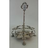 Large Warwick size 8 bottle cruet frame in silver coloured metal,