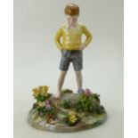 A Crown Staffordshire figurine of a boy standing,