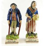 OLD AGE - Pair of Staffordshire figures, early 19th century pearl ware 22cm.