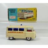 Corgi 463 Cream Commer Ambulance in near mint condition and about good condition original box.
