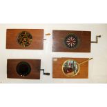 Four mahogany framed mechanical magic lantern slides - three crank winding Kaleidoscope type,
