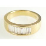 18ct Gold Ladies Ring set with 9 Baguette diamonds, size R, 8.