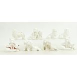 Eight Royal Worcester small dog models by Doris Lindner all in white including young foxes and