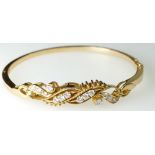 18ct Gold Bangle set with 14 Diamonds, 14.