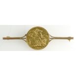 Full Sovereign Gold mounted Brooch - 10.3g inc steel pin.