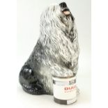 Beswick advertising model of seated Old English Sheep Dog with paw on Dulux paint tin 1990,