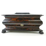 Georgian Coromandel wood tea caddy of Sarcophagus form, the interior fitted,