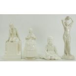 Four rare Royal Worcester white figures comprising 'Grapes' by Francois Clemencin, shape 2799,