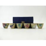 MOORCROFT SAKI CUPS, set of six, cased. Each measuring 4.