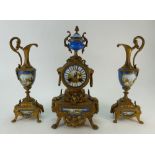19th Century French spelter and porcelain clock set comprising ornate spelter clock with