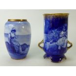Royal Doulton two handled vase decorated with blue & white scenes of a small girl holding a dolly