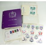 Queens Silver Jubilee album containing many Commonwealth stamp covers,